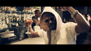 Some Rapper Enjoying a Bar with Champagne